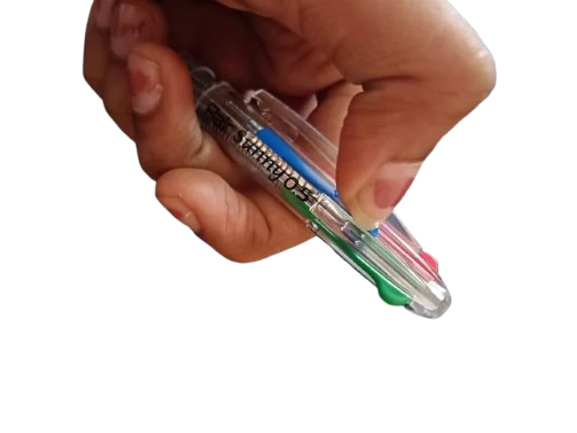A hand holding a multi color pen with a spring on a refill