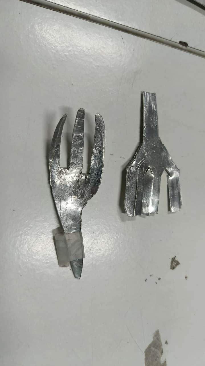 A formed aluminium fork-shaped piece